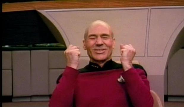 Captian Picard from Star Trek cheering